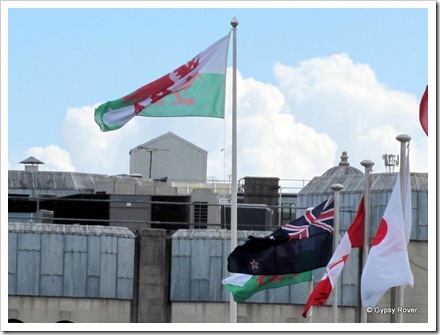 NZ and Welsh flags flying together.