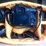 The padded internal camera area can be  completely removed to turn the bag into a normal backpack with a single large compartment. The central partition in the main bag body also opens up