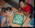 Lauren and Telma playing Scrabble