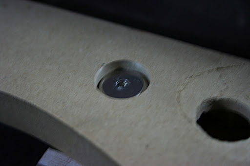 The body side of the joint uses a stainless steel washer and large-head connector bolt with a hex socket.