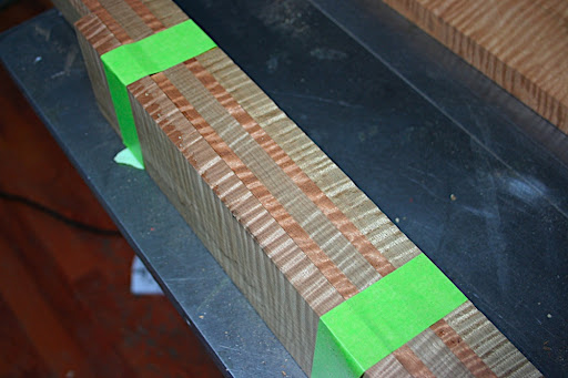 The "flame sandwich". Originally planned as the neck for Prototype 3, i opted to use it on this guitar instead. Five laminates... three flamed roasted maple, with two figured mahogany stringers.