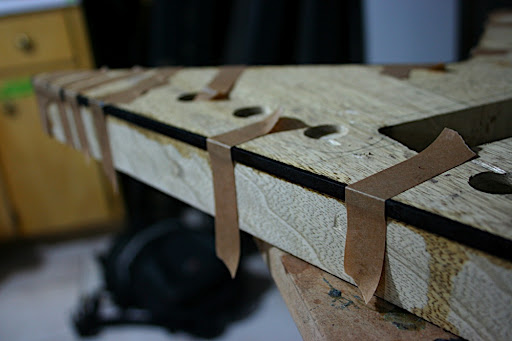 2010.02.11 Update: Black binding added to the body using high-tack tape and lots of cyanoacrylate glue (aka "super glue" or "Krazy Glue").