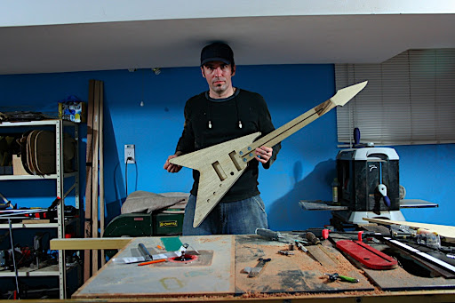 2010.02.12 Update: Bolted together, body and headstock bound, neck heel and body contours done.