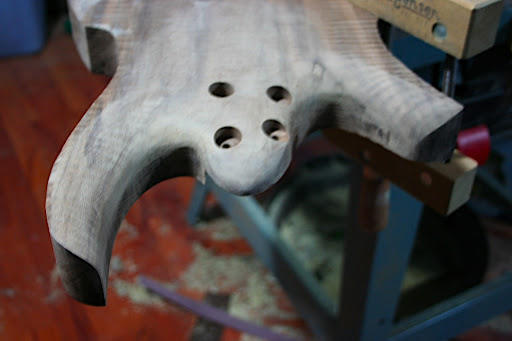While the fretboards were clamped and waiting for the glue to cure, i decided to start carving the body contours of Proto 1.