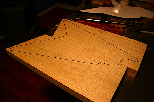 The body outline for the Aviator are drawn on the body blank after it's been un-clamped and surfaced.