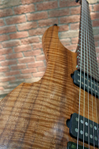 Curly black walnut body.