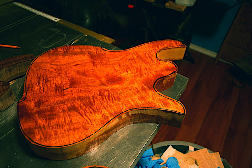 This Javelin was the second 1-piece body cut from the slab of figured mahogany. It has a light coat of polymerized tung oil on it to seal it, but also to see how the grain would pop. WOW!
