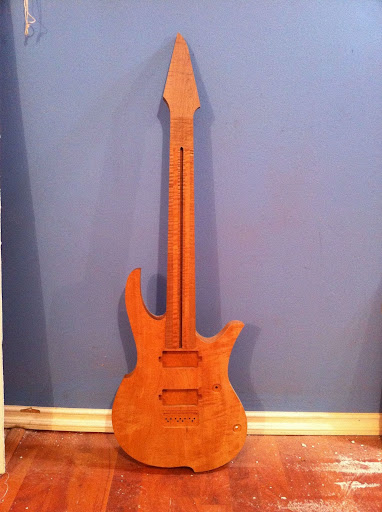 The neck has been cut down from 27" scale to 25.5" as per Misha's request. The truss rod channel just needs to be made a little longer, which will be done with a steady hand and a sharp chisel.