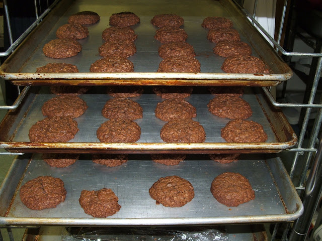 awaiting their white chocolate drizzle...I need a baking rack like this, yes?