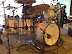 Ludwig kit with a classic tuning/sound. Same kit we have at KCC Troy, actually. New heads every 2-4 shows. Fun visit with the drum tech. Shure mics throughout - SM27's on toms, SM7 on snare, Beta52/Beta91 in the kick. The kit sounded great!