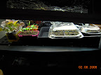 Seedling shelf - used greenhouse domes & brought inside during some bitter cold nights.