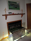 Placed dishtub under seedling shelf lights on hearth in my office. I don't use the fireplace in my office...