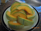 14 weeks, fully ripe (and probably last) sweet n' early cantaloupe (some pieces already eaten)