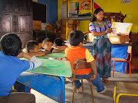 Candelaria Esquina teaching at the Escuelita.