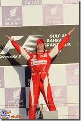 Race winner Fernando Alonso (ESP) Ferrari on the podium. 
Formula One World Championship, Rd 1, Bahrain Grand Prix, Race, Bahrain International Circuit, Sakhir, Bahrain, Sunday 14 March 2010.
