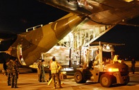 [Australian soldiers assist in the loading of a Singapore aircraft for Padang.[4].jpg]
