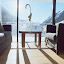 Sitzgruppe mit Deko und Aussicht auf Ischgl im Winter Sitzgruppe mit Deko und Aussicht auf Ischgl im Winter