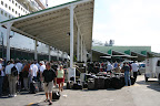 Luggage and passengers waiting to board the Queen Mary 2