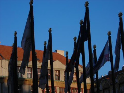 Flags in Prague in shadow