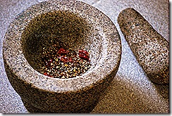 Crush pepper and red chilli