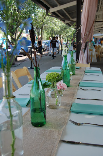 Wine bottle centerpieces and burlap table runner