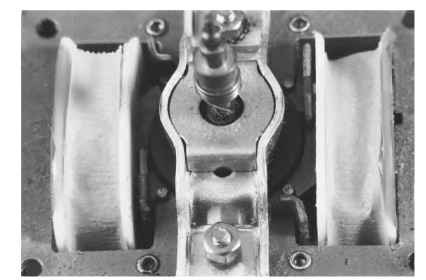  Shaded-pole synchronous motor, permanent-magnet rotor end.