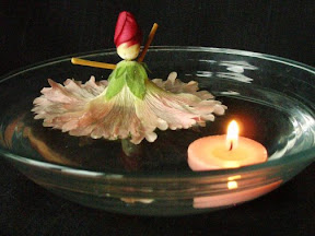 Floating Hollyhock Doll and Candle