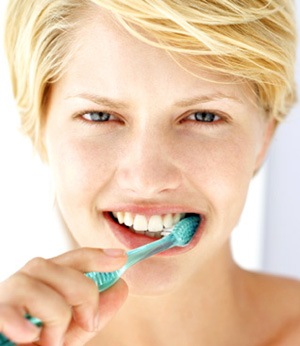 [lady brushing teeth[2].jpg]