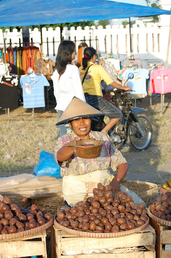 She either wanted me to buy some fruit, or wanted me to give her money...I dont remember
