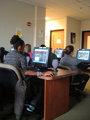 Shyhidah Akbar and Morgan Besser busy designing FSQOutreach.ning, a SE online community for neighborhood youth at the Computer Lab at Southeast Community Severcies, taught by Ryan Williams. Shyhidah Akbar and Morgan Besser busy designing FSQOutreach.ning, a SE online community for neighborhood youth at the Computer Lab at Southeast Community Severcies, taught by Ryan Williams.