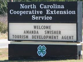 Road sign welcoming Robeson County Tourism Extension Agent