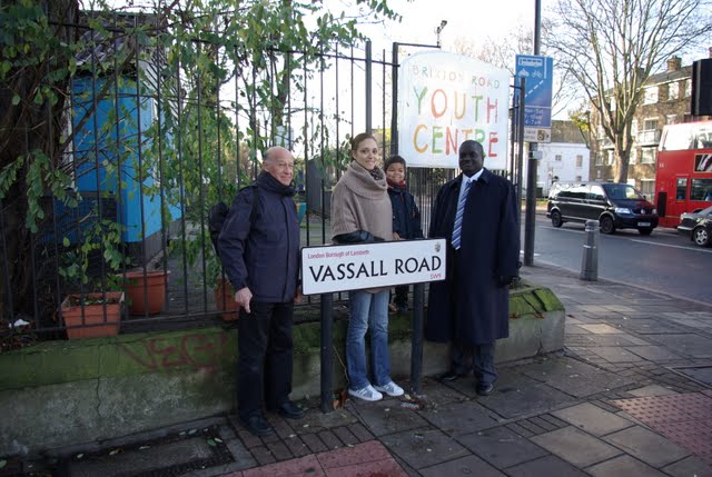 Vassall Labour candidates standing by Vassall Road sign, SW9