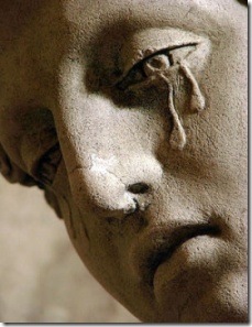 redemptive suffering statue with tears