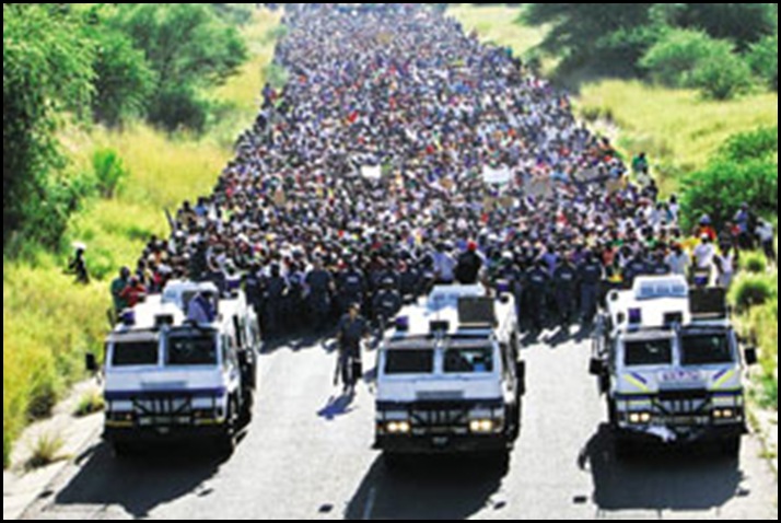 WE will disrupt WC2010 Oukasie protestors outside Brits 5000 people heading to Madibeng municipal offices March92010