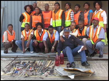 East London citizen-crime fighters and their haul of confiscated weapons sgt Vusisile Slatsha