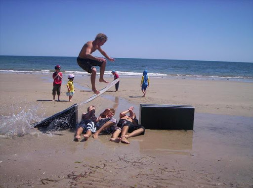mitch Mitch with what looks like a shuv on the kicker over his 3 mates to flat rail