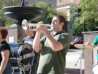 Photo: Rob plays a trumpet solo for the Madison crowd.