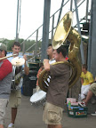 Photo: Ian lays down the bass line for the brass band on the sousaphone.