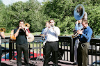 Photo: Mike, Rob, and Kyle front and center with the brass band.
