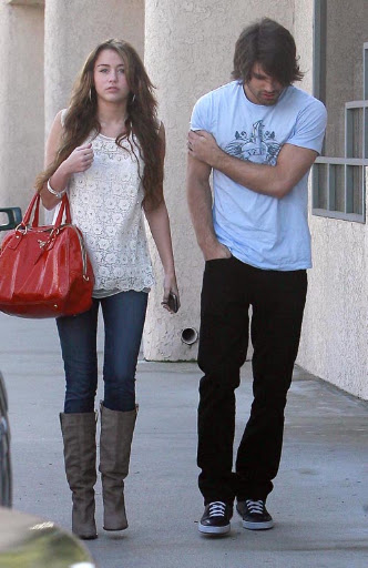 03-22-09 Studio City, CA Miley Cyrus and her boyfriend Justin Gaston out for breakfast at the Studio Cafe in Studio City, CA... Non-Exclusive Pix by Flynet ©2009 818-307-4813 Nicolas 323-974-6007 Jay 310-466-8617 Scott