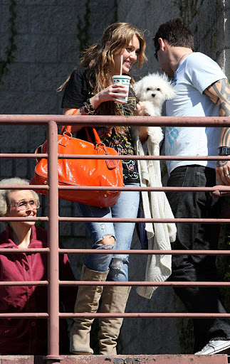 IMAGE ID # 2025744 Miley Cyrus and her crew stop off to grab a bite to eat at an In and Out Burger before heading over to a recording studio in Burbank Ca! CR: RIV/ Fame Pictures 03/23/2009 --- Miley Cyrus --- (C) 2009 Fame Pictures, Inc. - Santa Monica, CA, U.S.A - 310-395-0500 / Sales: 310-395-0500
