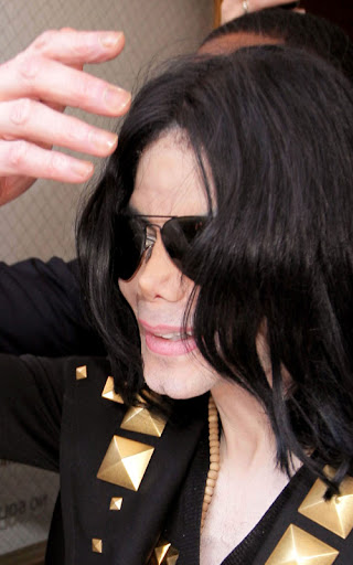 **File Photo** * JACKSON HOSPITALISED AFTER CARDIAC ARREST - REPORT MICHAEL JACKSON is reportedly in hospital after suffering a heart attack. The Thriller superstar's aides frantically called an ambulance to come to Jackson's Holmby Hills mansion in Los Angeles earlier today (25Jun09), according to TMZ.com. Reports suggest the singer's condition was so bad, medics were forced to administer CPR en-route to a nearby hospital - to keep him alive. Jackson's worried family members are allegedly rushing to his bedside. Earlier this month (Jun09), family insider Arthur Phoenix told WENN the superstar was in a bad way and should not be considering a 50-concert run in London, scheduled to start in July (09). He insisted the concerts would not happen, stating, "Michael is not mentally, physically or spiritually ready for these shows. There's something missing in his soul... It's over! There are family members who feel the same way but they're afraid to speak." Phoenix fears the pressure of the c