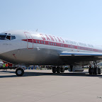 Travolta's plane being pulled into AeroShell Square