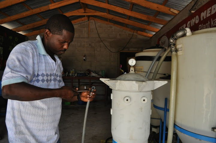 JP Manager George fixes the biodiesel transesterifier.