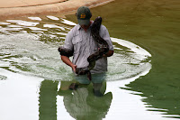 Dude with water python
