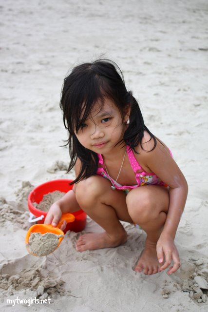 Zara playing sand