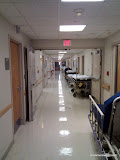 Trish goes around the corner to the OR, bye boobies!