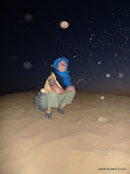 Dust swirls around us on an overnight camping trip in the Sahara desert.