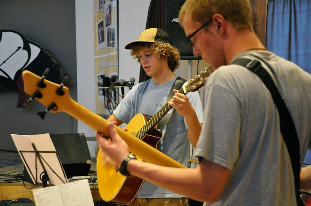 Garret playing guitar, and Ryan on the bass during worship for our youth group.