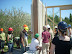 The first prefabricated straw bale wall panel is set in position